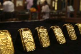 Altin-guclu-dolar-ve-yukselen-petrolun-etkisiyle-geriledi-featured