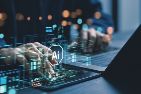 Humans are using laptops and computers to interact with AI, helping them create, code, train AI, or analyze big data with fast, cutting-edge  technology.
